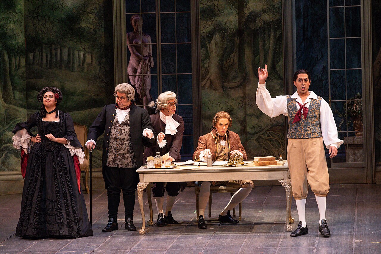Costumed singers performing The Marriage of Figaro at Florida Grand Opera
